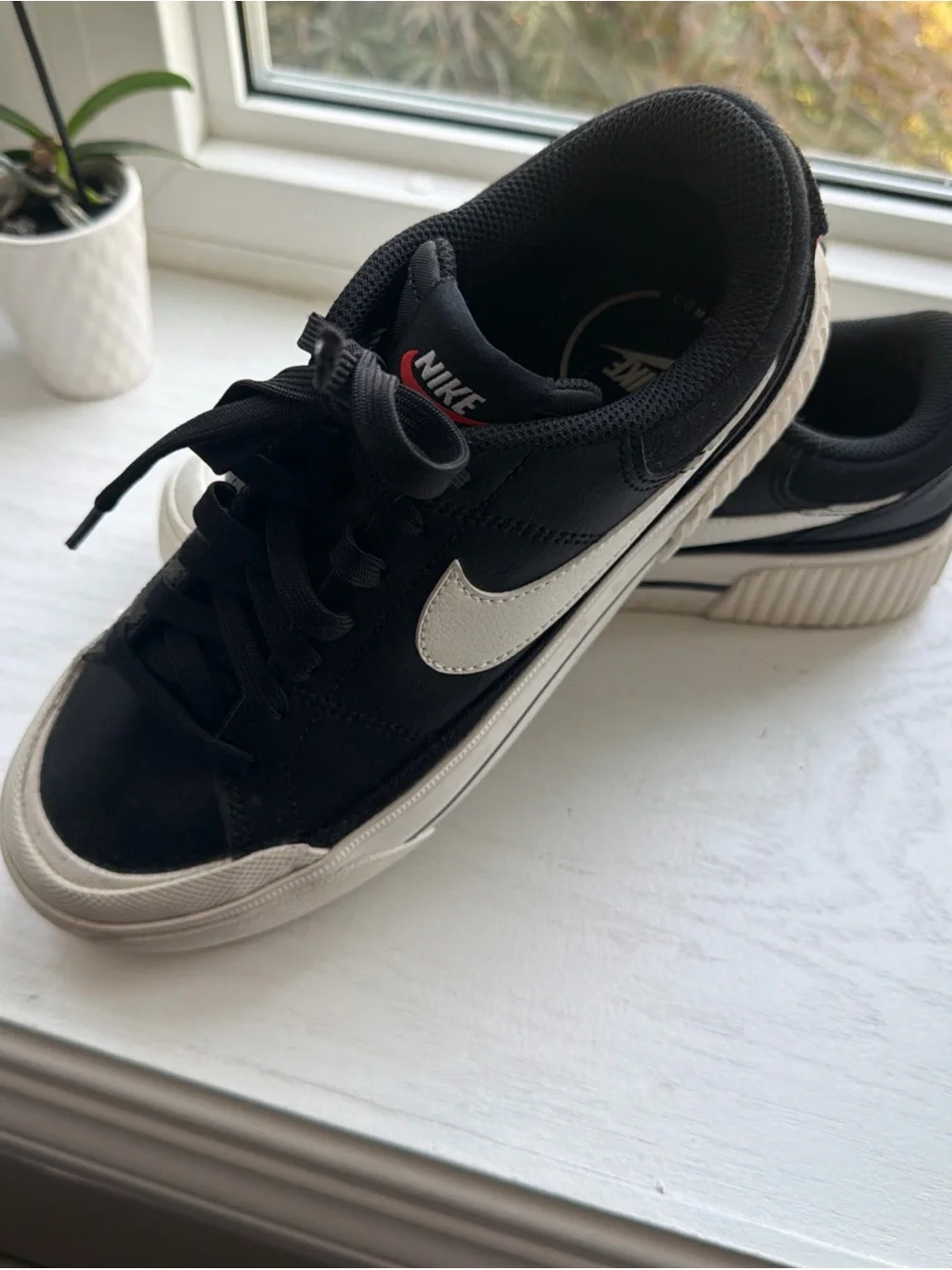 Nike Black Sneakers with White Swoosh